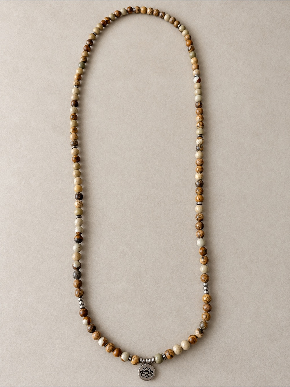 Long Earth Tone Beaded Necklace with Silver Tone Lotus Charm